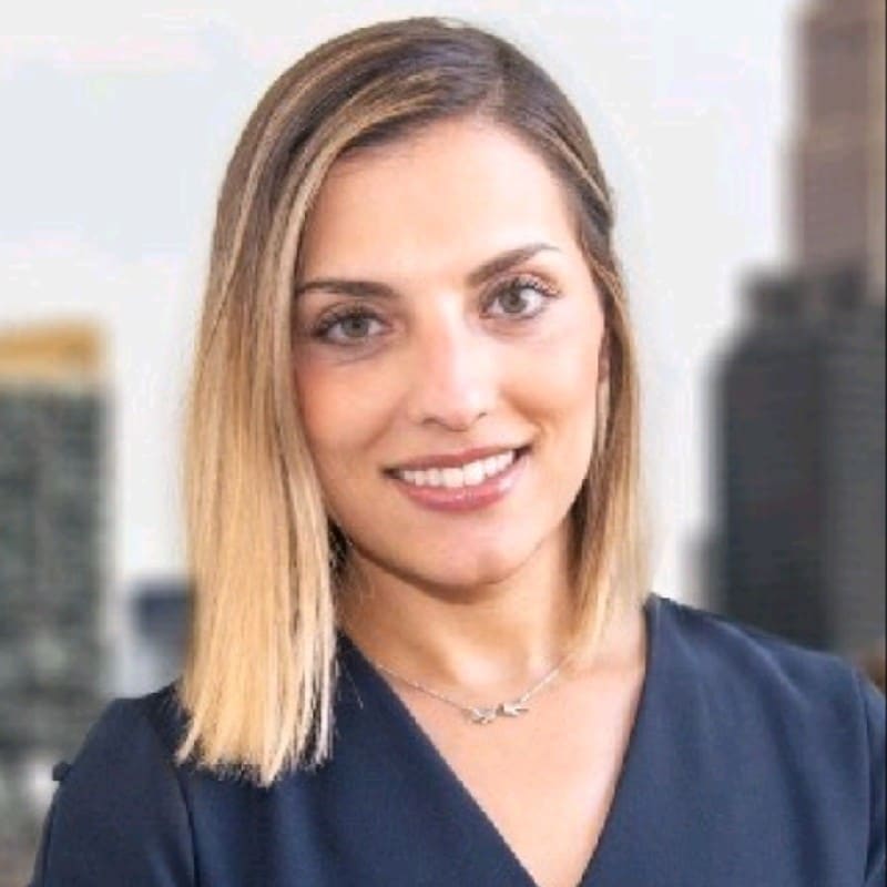 Professional woman in urban setting.